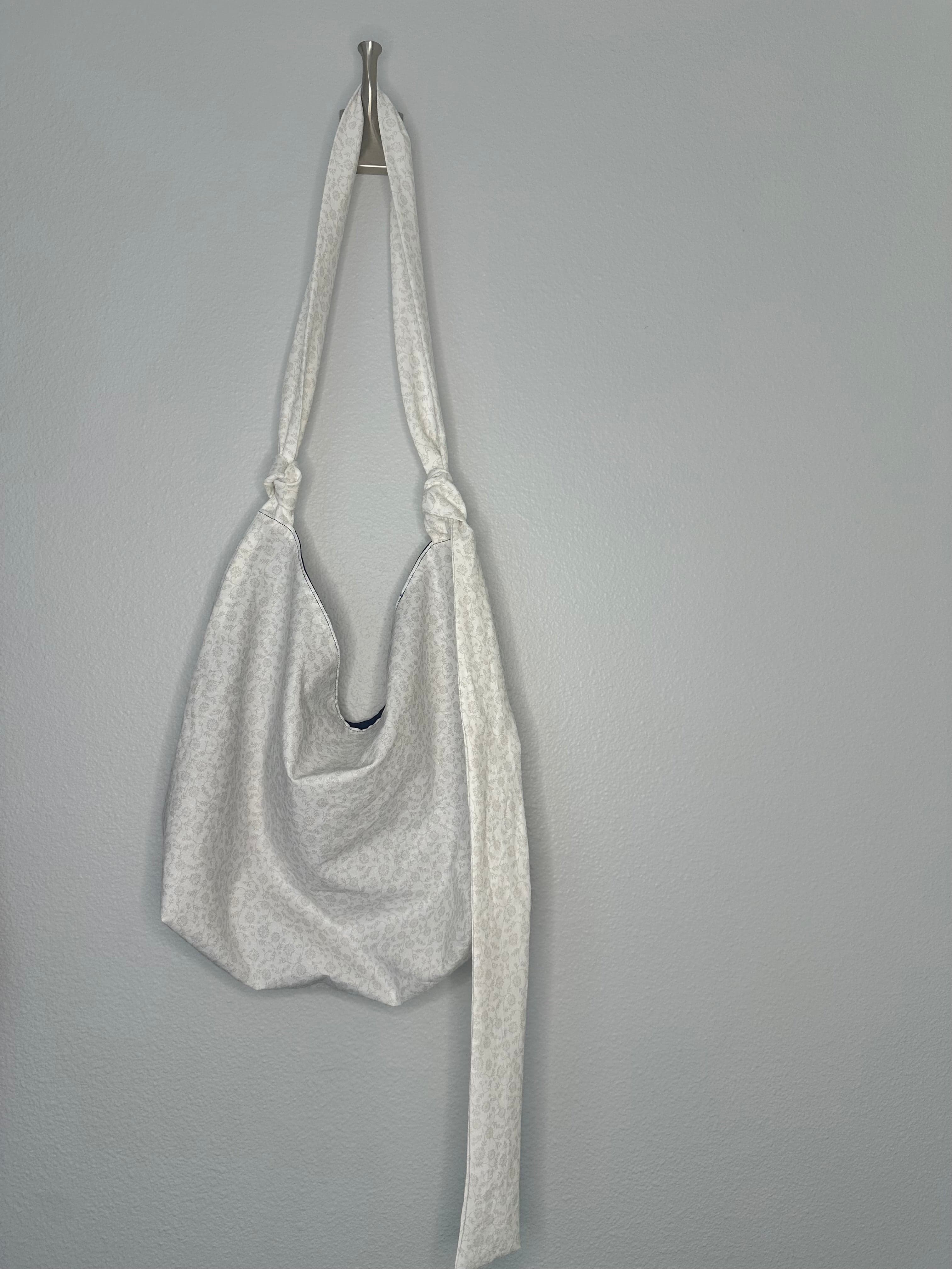 White Floral Slouchy Shoulder Bag with Adjustable Strap & Interior Pocket